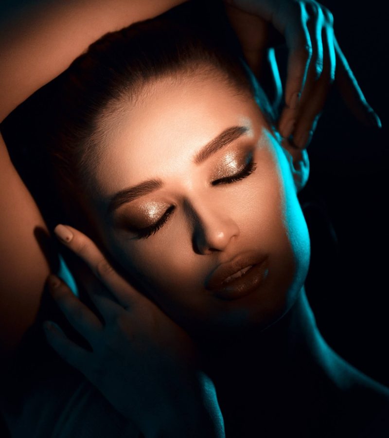 woman-in-shadow-light-on-eyes-with-beautiful-makeup-1.jpg
